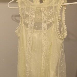 Ladies sheer sleeveless top with built-in cami size small in great condition